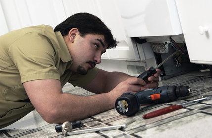 Household appliance repair technician